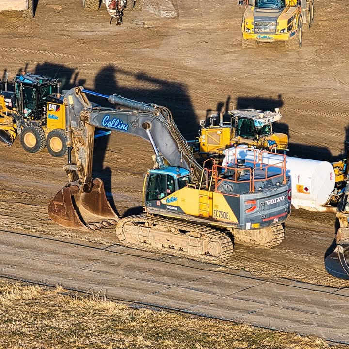Can you identify the diggers and heavy machinery on site at Universal UK?